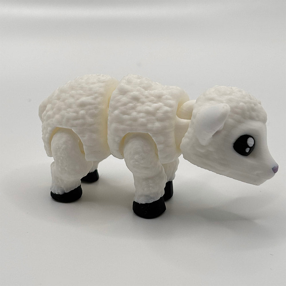 Side-view of a free-standing fidget toy designed as a cute fluffy lamb, which has been 3D printed to a high standard by 3D Busy Hands.