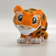 A 3D Printed model of a Bengal Tiger with orange, black & white stripes - available to buy