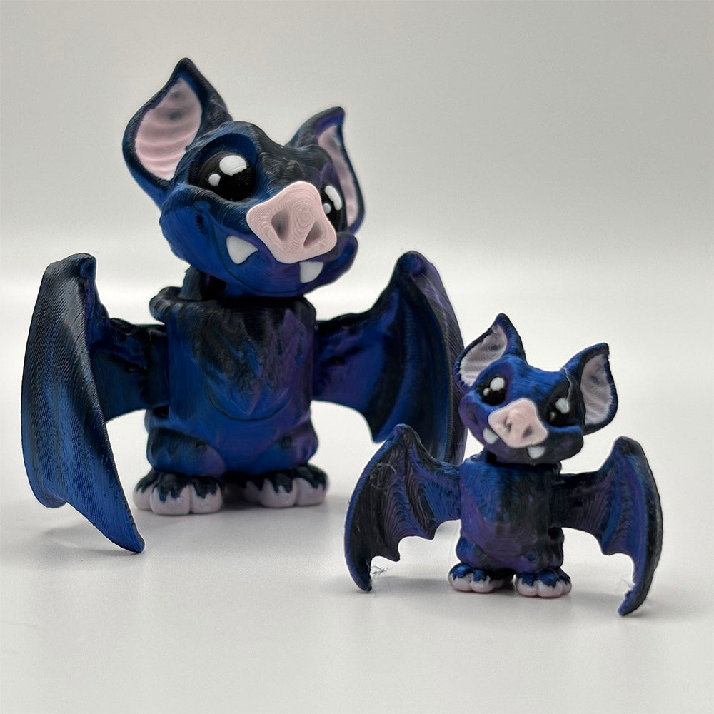 3D printed toys styles as vampire bats with silky blue-black filament