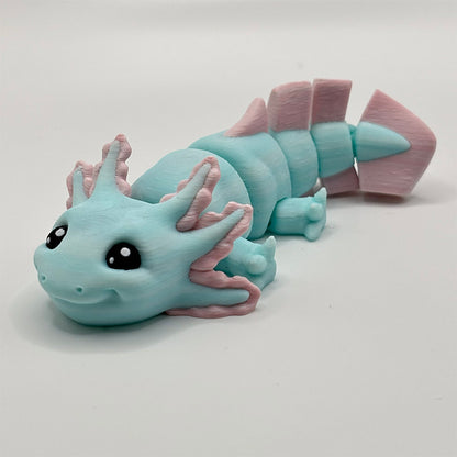 3D printed axolotl toy in ligh green with pink fins