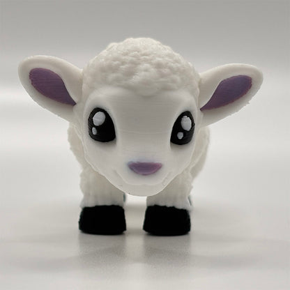 3D printed fidget toy lamb with segmented body, purple ears and black feet, shown standing on four legs