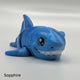 Designed by MatMire Makes and printed to a high standard by 3D Busy Hands, this articulated fidget toy represents a great white shark.