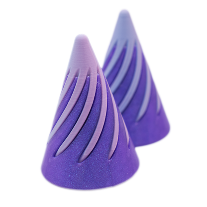 These 3D printed cones are created in two parts.  The pale blue-lilac insert is designed to pass-through the glittery purple exterior.