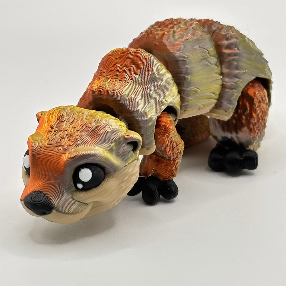 Designed as a cute otter pup, this 3D printed fidget toy is flexible with articulated parts