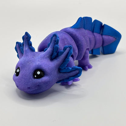 This 3D printed axolotl toy with articulated body appears to colour shift between blue and purple