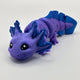 This 3D printed axolotl toy with articulated body appears to colour shift between blue and purple